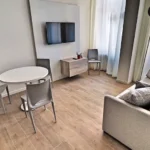 Soggiorno del Bilocale nel centro storico di Trento, Hotel Accademia