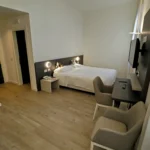 Soggiorno del Monolocale dell'Hotel Accademia Trento, appartamento centro storico